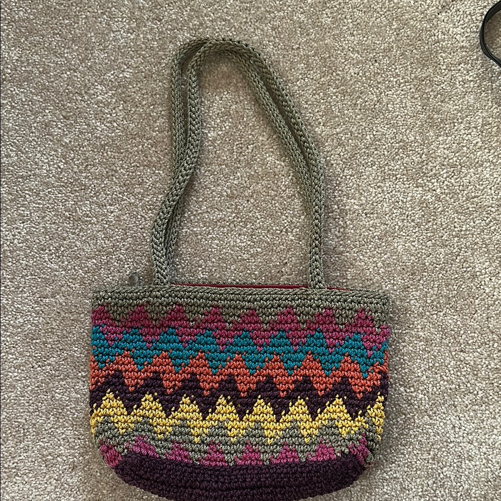 The Sak Green and Orange Shoulder Bag with Intricate Woven Patterns